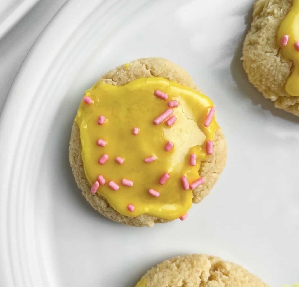 Best ever healthy Lofthouse sugar cookies with glaze & sprinkles! The perfect soft sugar cookies recipe by Healthful Blondie.