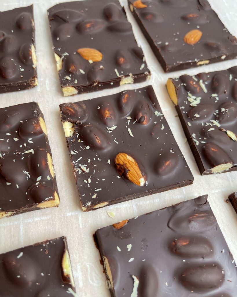 Healthy snack recipe. Three ingredient chocolate bark with roasted almonds. Made in a fridge and ready in 25 minutes. Recipe by Healthful Blondie.