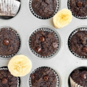 Healthy mini double chocolate chip banana muffins that taste like chocolate cupcakes and naturally sweetened with maple syrup.