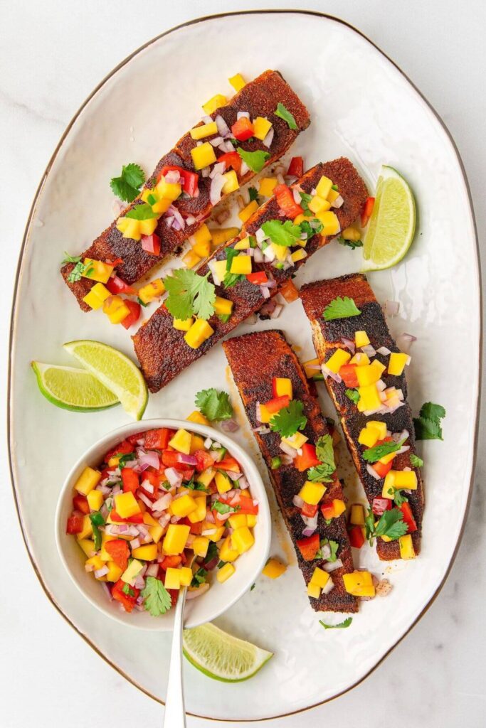 four pan seared blackened salmon fillets with easy fresh mango salsa