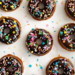 Fluffy healthy baked donuts with chocolate glaze and colorful sprinkles