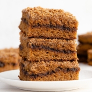 stack of healthy cinnamon swirl coffee cake with cinnamon sugar layer in the middle