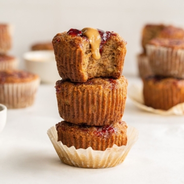 stack of three peanut butter and jelly banana bread muffins