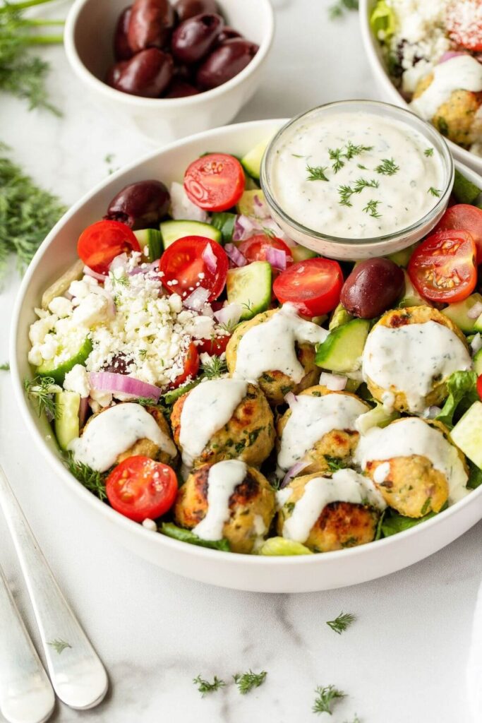 healthy Greek chicken meatball salad with homemade tzatziki sauce