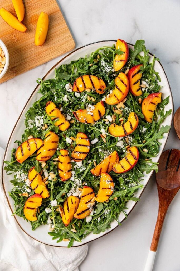 balsamic grilled peach salad with goat cheese and arugula
