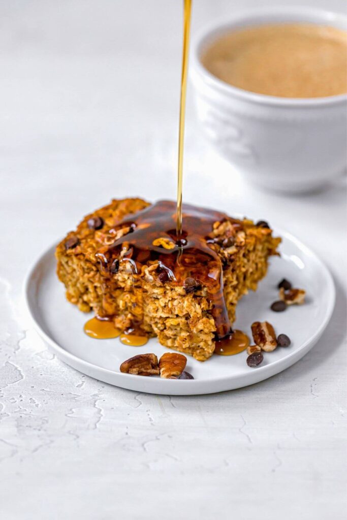 pumpkin baked oatmeal with maple syrup pour shot