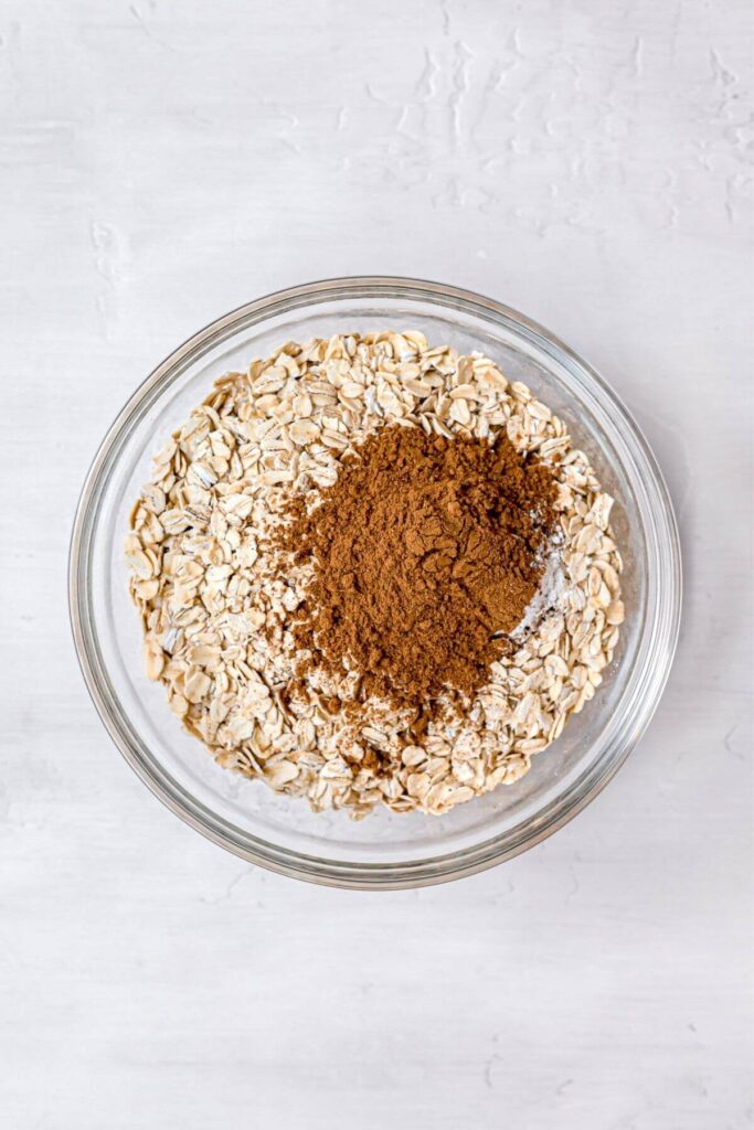 rolled oats and pumpkin pie spice in a bowl