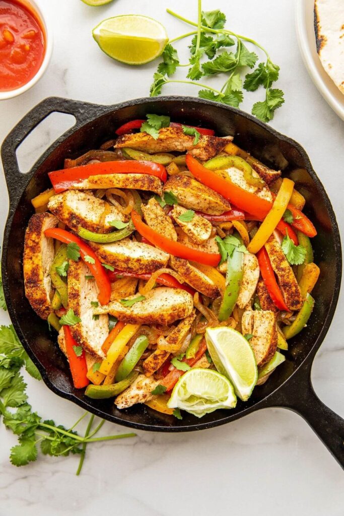 healthy chicken fajitas in a pan after cooking