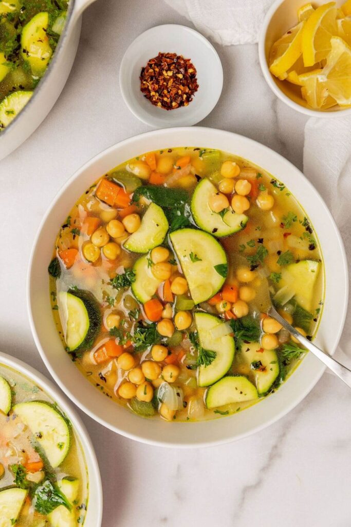 Greek soup with zucchini, chickpeas, and carrots