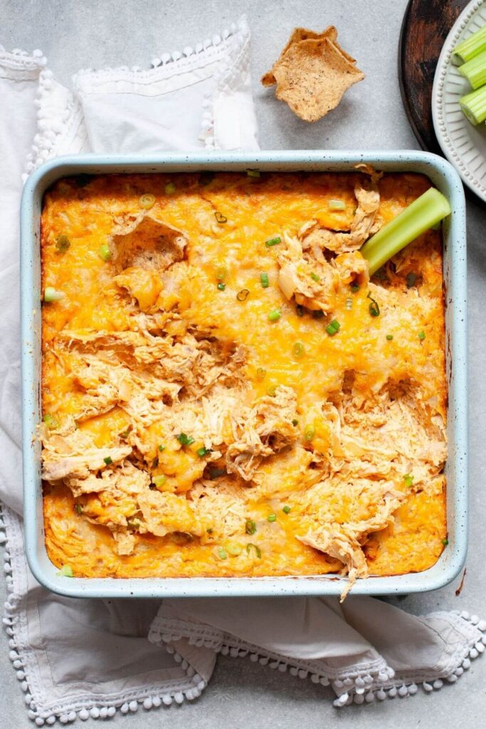 healthy buffalo chicken dip with celery stick