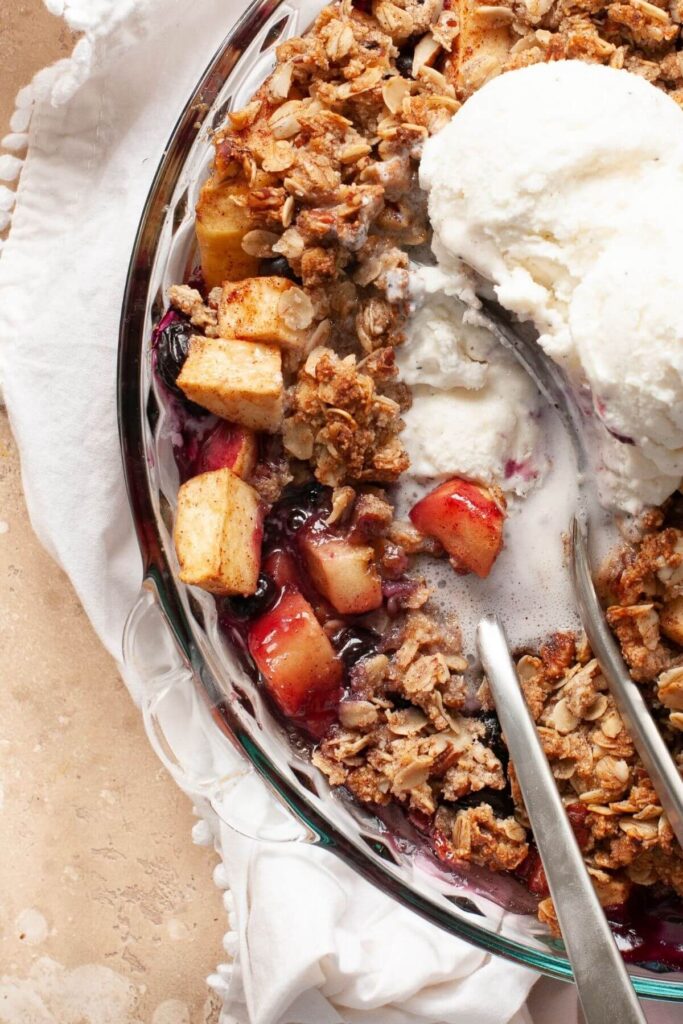 healthy apple and blueberry crumble with a crispy oat streusel