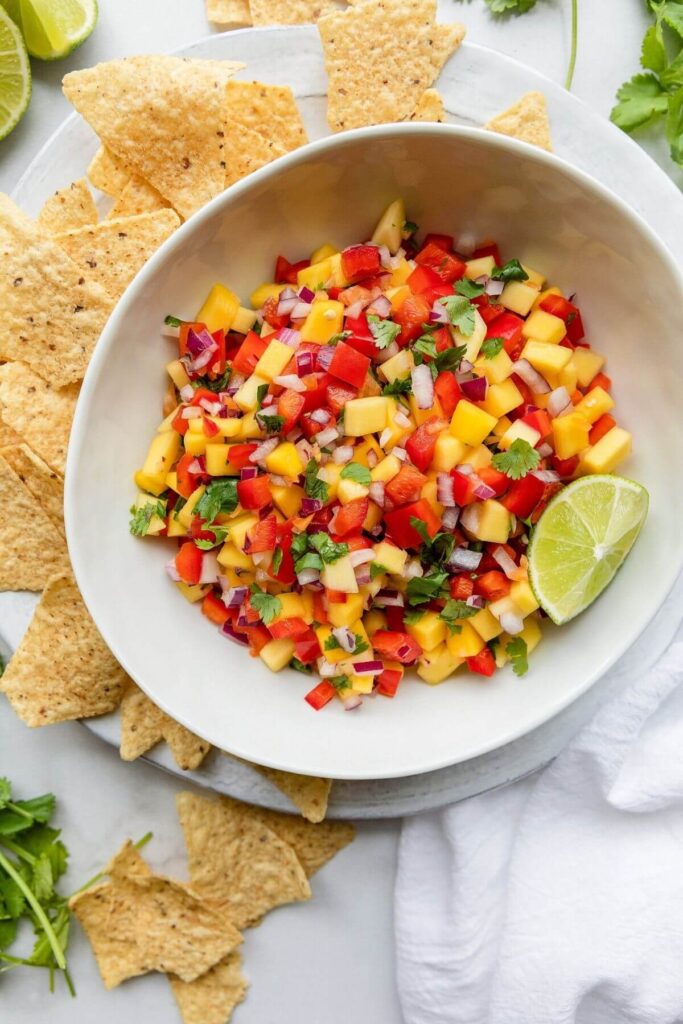 habanero mango salsa in a bowl with chips