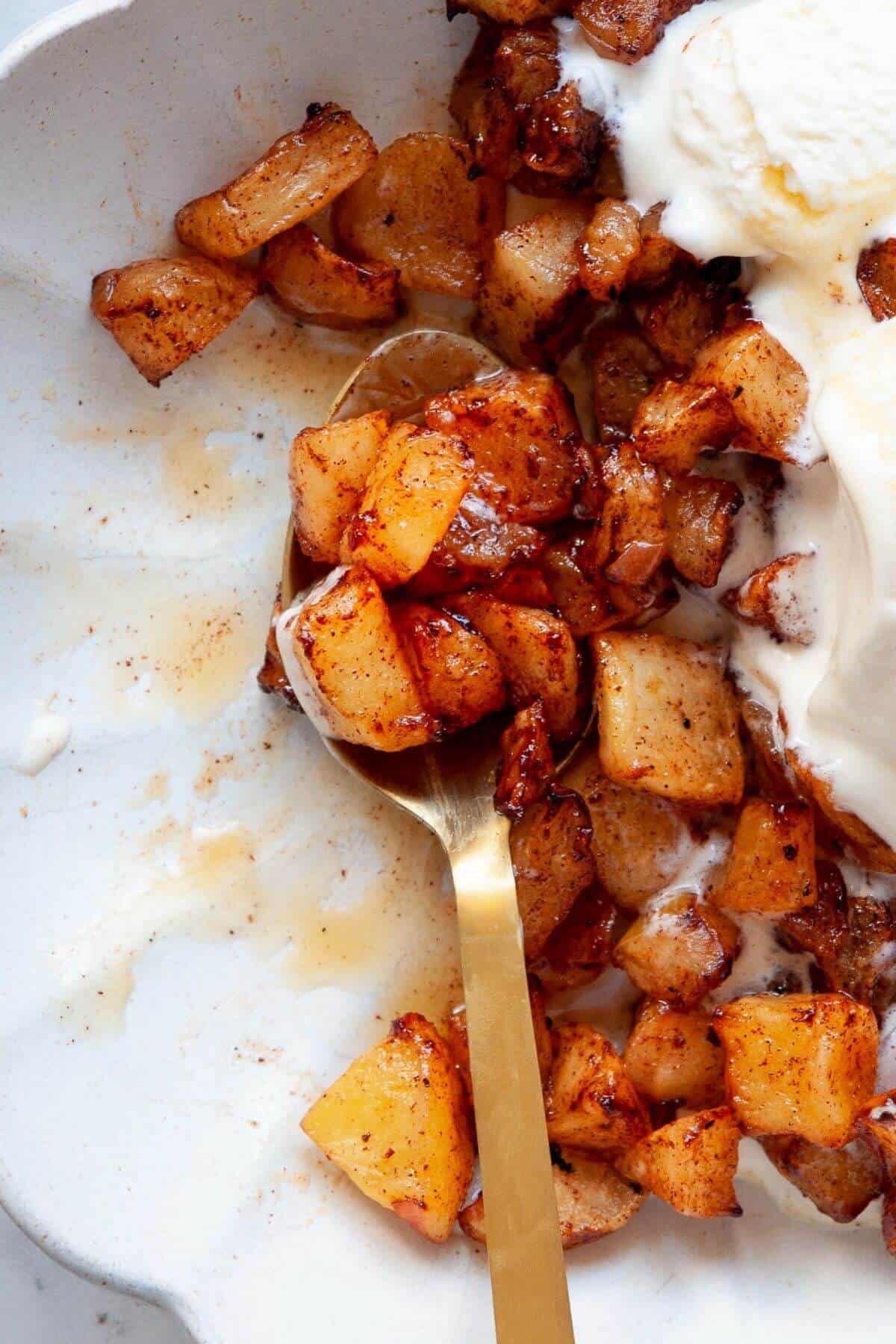 Close-up of cinnamon maple air fryer apples that are refined sugar free.