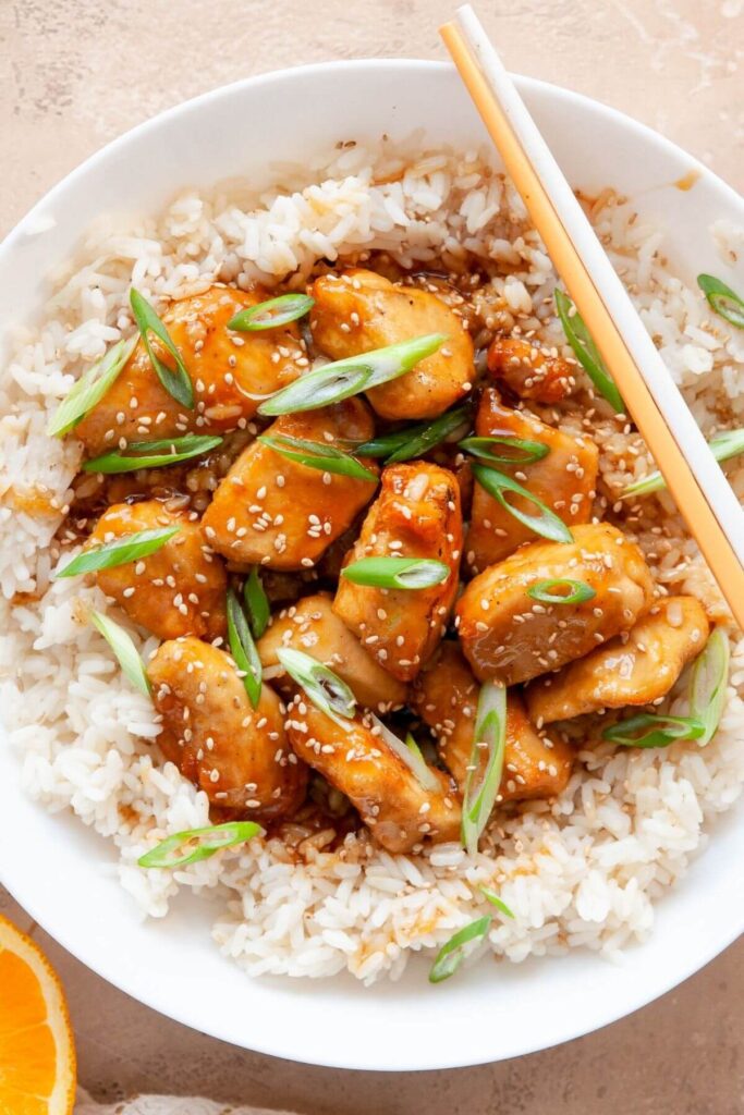 healthy air fryer teriyaki chicken in a bowl with white rice