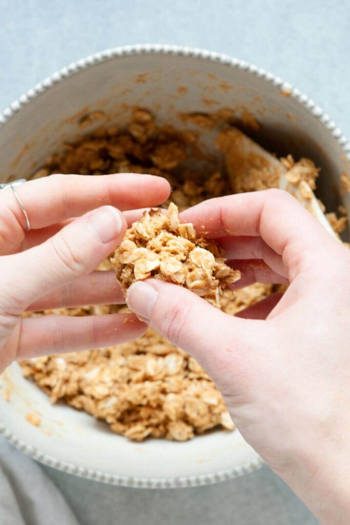 how to roll out and form 3 ingredient peanut butter oatmeal energy balls
