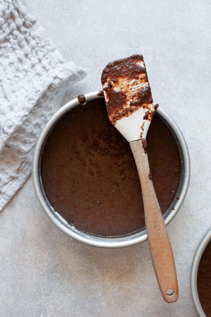 almond flour chocolate cake batter in a 6-inch cake pan