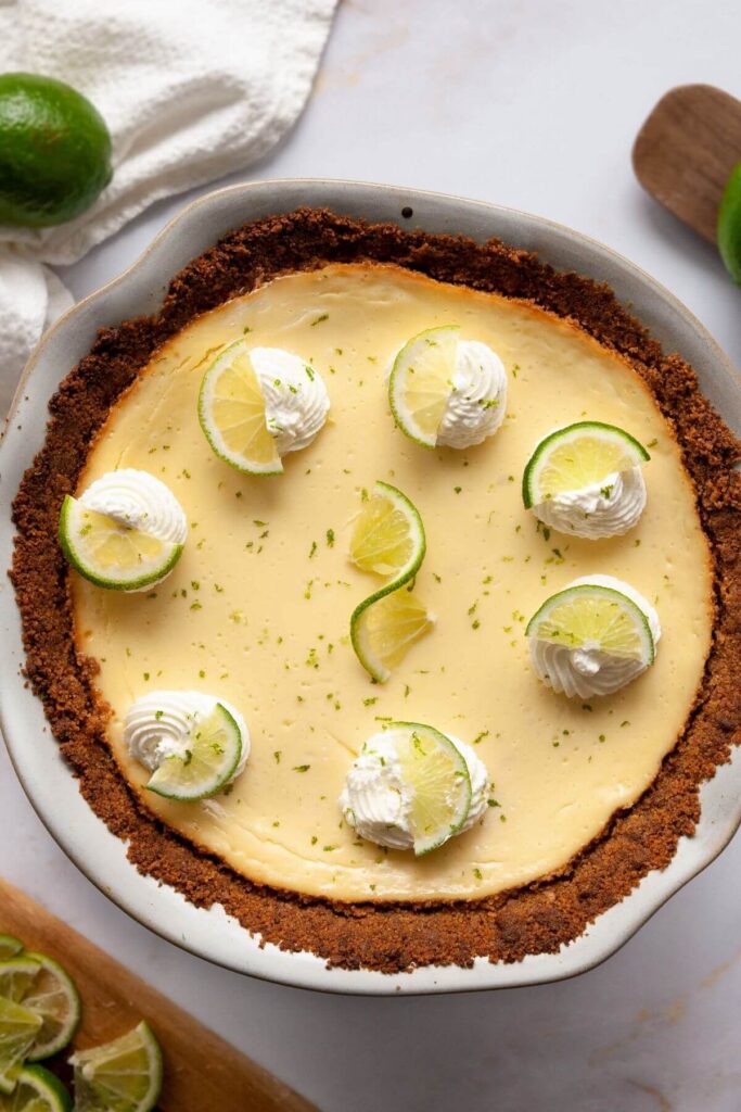 key lime pie with gluten free crust in a pie dish