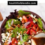 mixed green strawberry goat cheese salad