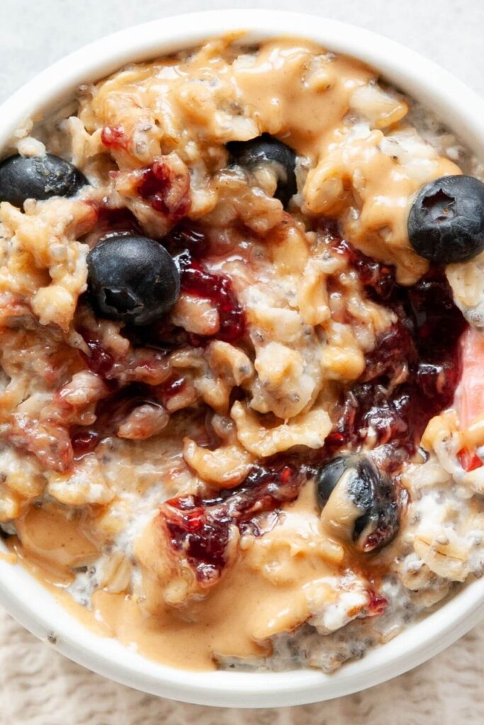 peanut butter jelly protein oatmeal in a bowl