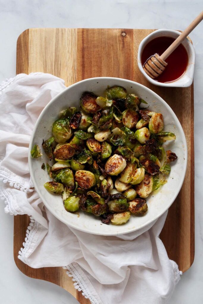 oven roasted honey sriracha brussel sprouts in a bowl