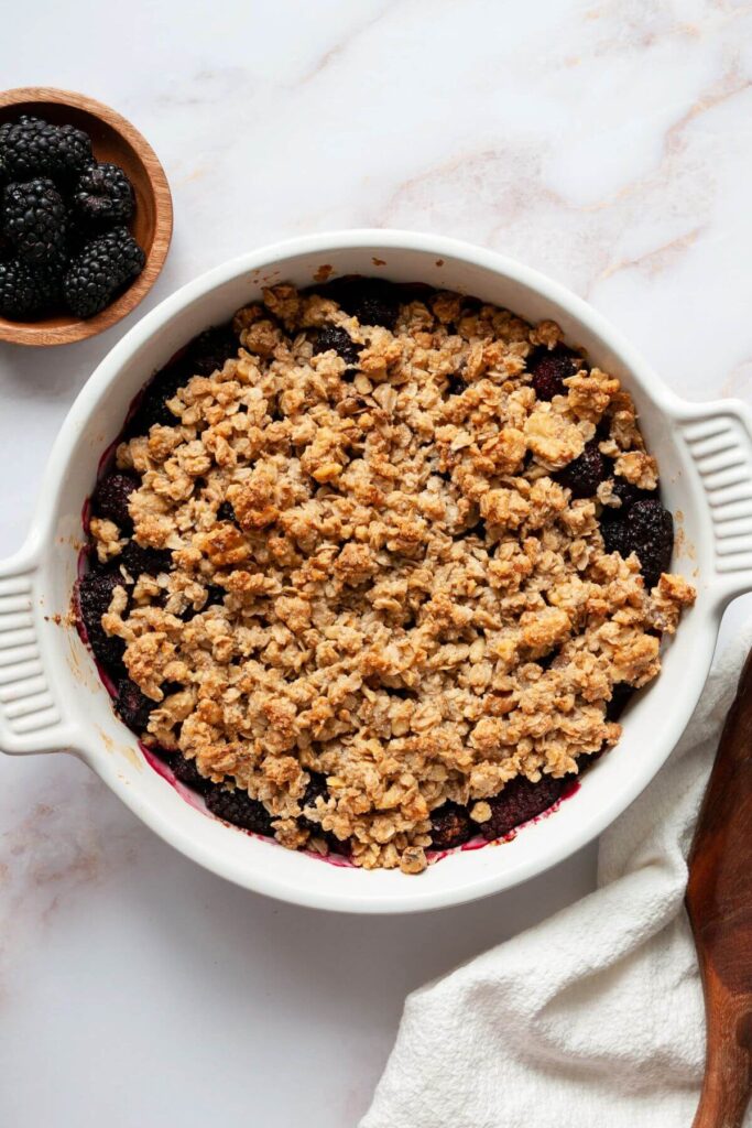 backed gluten free blackberry cobbler in a baking dish