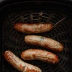 Crispy air fryer chicken sausages.