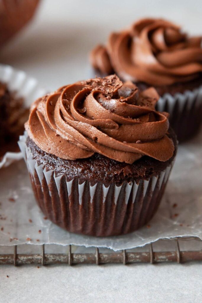 dairy-free chocolate frosting on top of a cupcake