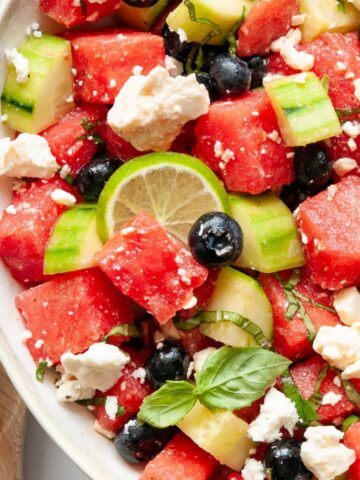 Watermelon blueberry salad with feta and homemade lime dressing.