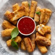 homemade gluten free mozzarella sticks cooked in air fryer or oven