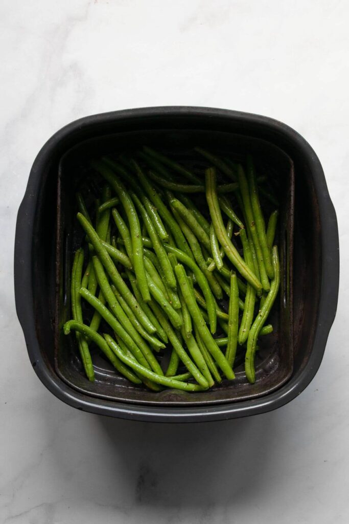 seasoned green beans in air fryer before cooking