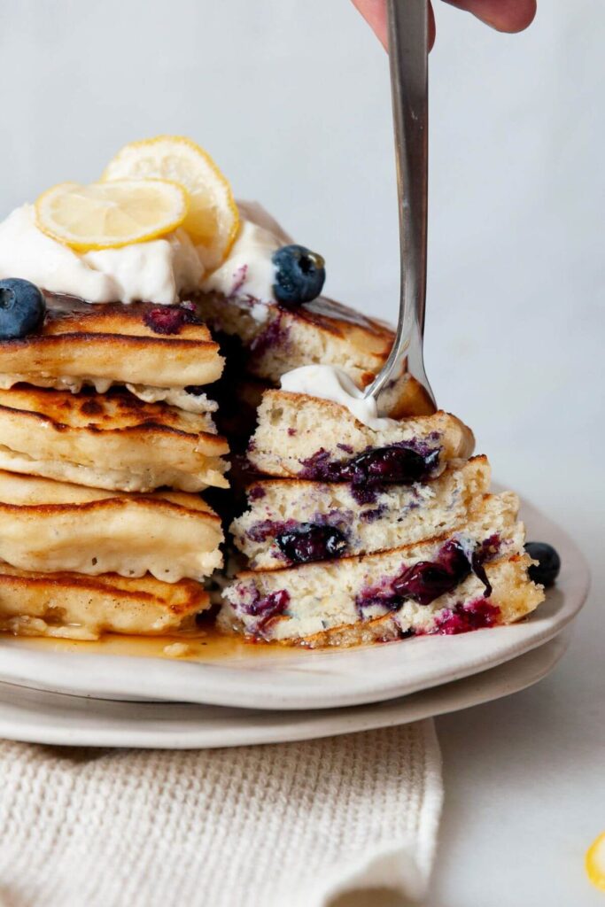 inside of ultra fluffy blueberry lemon pancakes