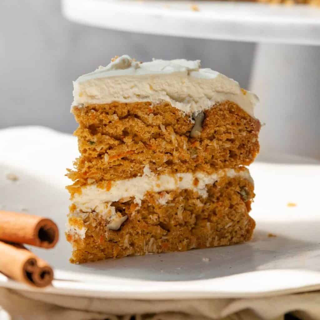 Super moist pumpkin carrot cake with healthy cream cheese yogurt frosting.