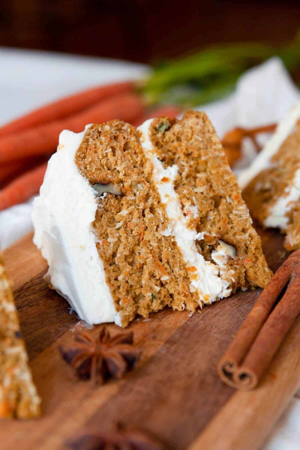 Super moist pumpkin carrot cake topped with healthy Greek yogurt cream cheese frosting.
