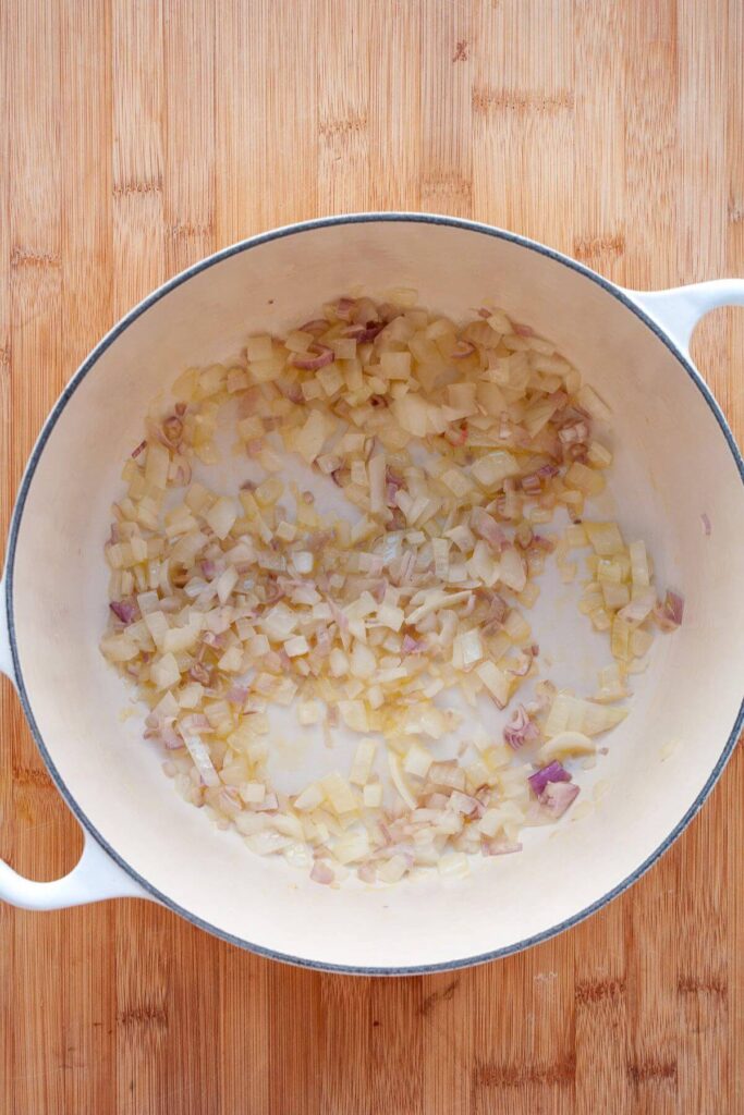 cooking chopped shallots and yellow onion until translucent