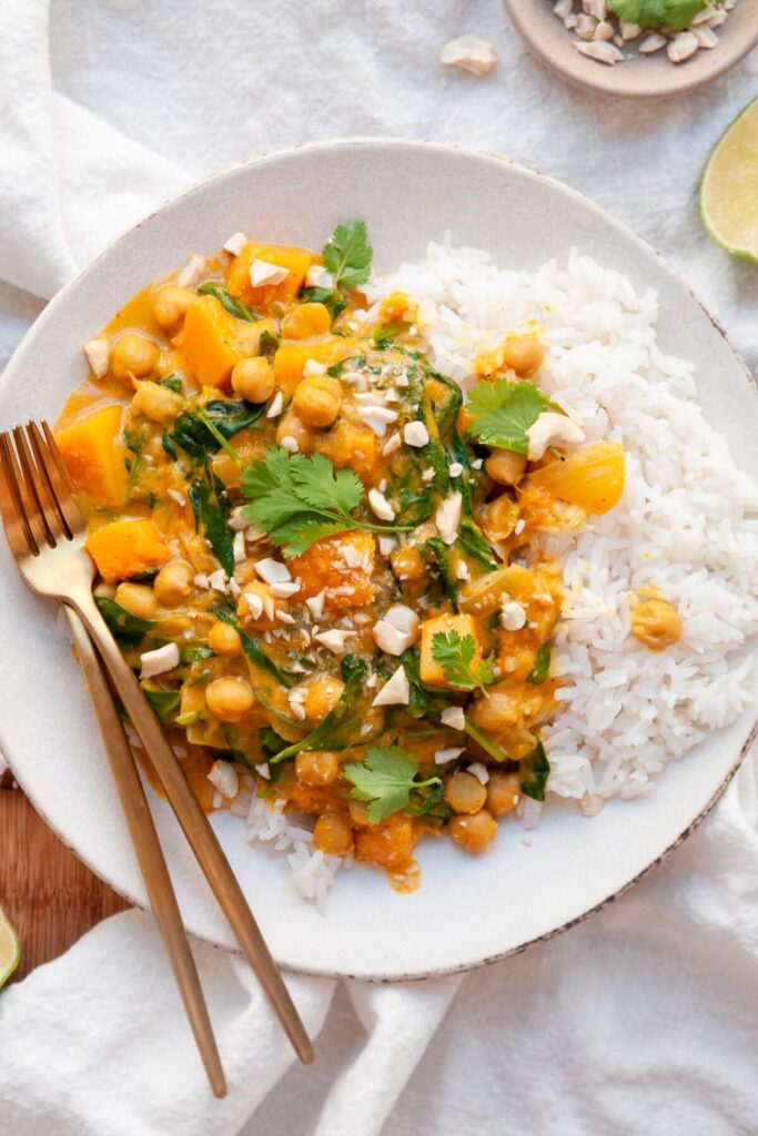 healthy butternut squash curry in a bowl with rice