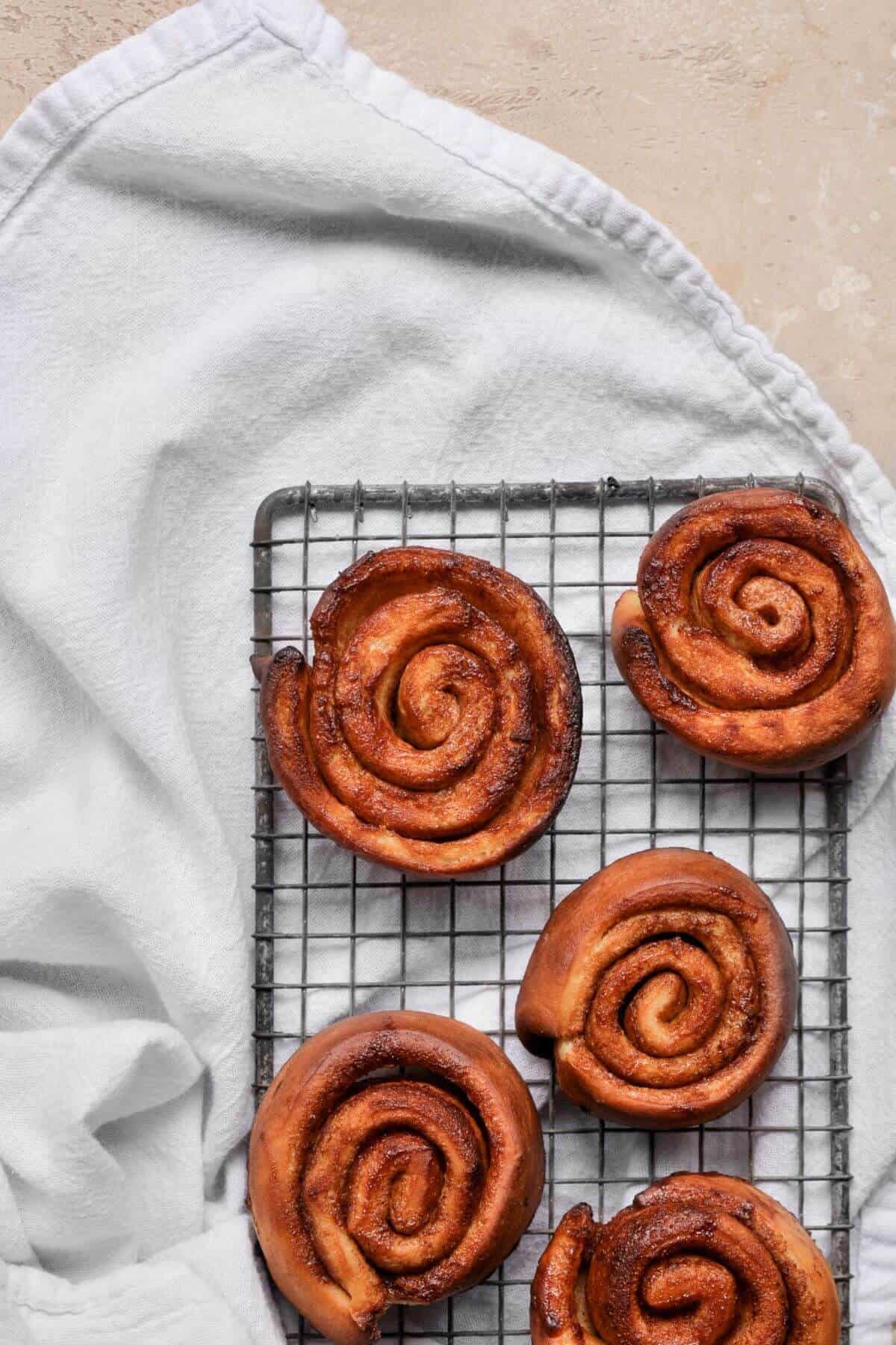 unfrosted air fryer cinnamon rolls to show how they look after being cooked