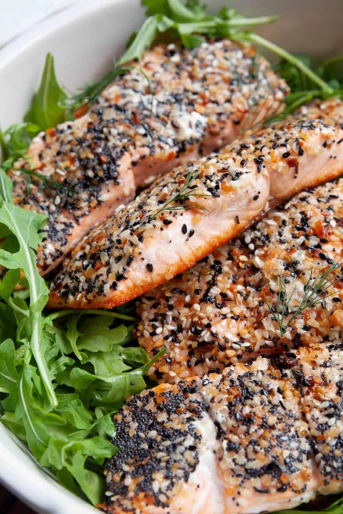 Side view of crispy everything but the bagel crusted salmon.