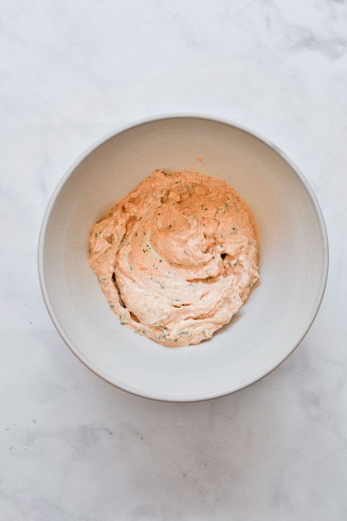 Blended Greek yogurt chicken marinade in a bowl.