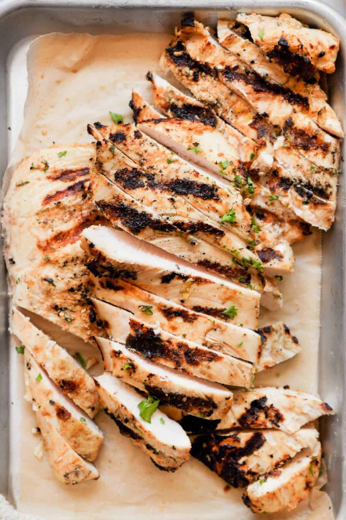 Super juicy, high-protein sliced Greek yogurt marinated chicken breast.