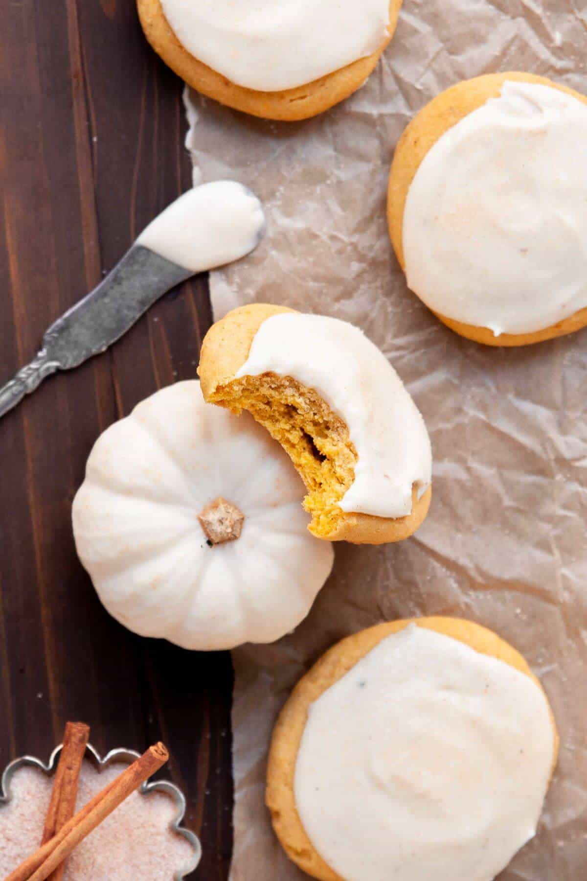 Super fluffy and thick gluten-free pumpkin cookies topped with cream cheese frosting.