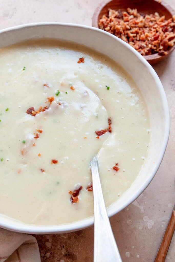 side view of thick and creamy cauliflower leek potato soup