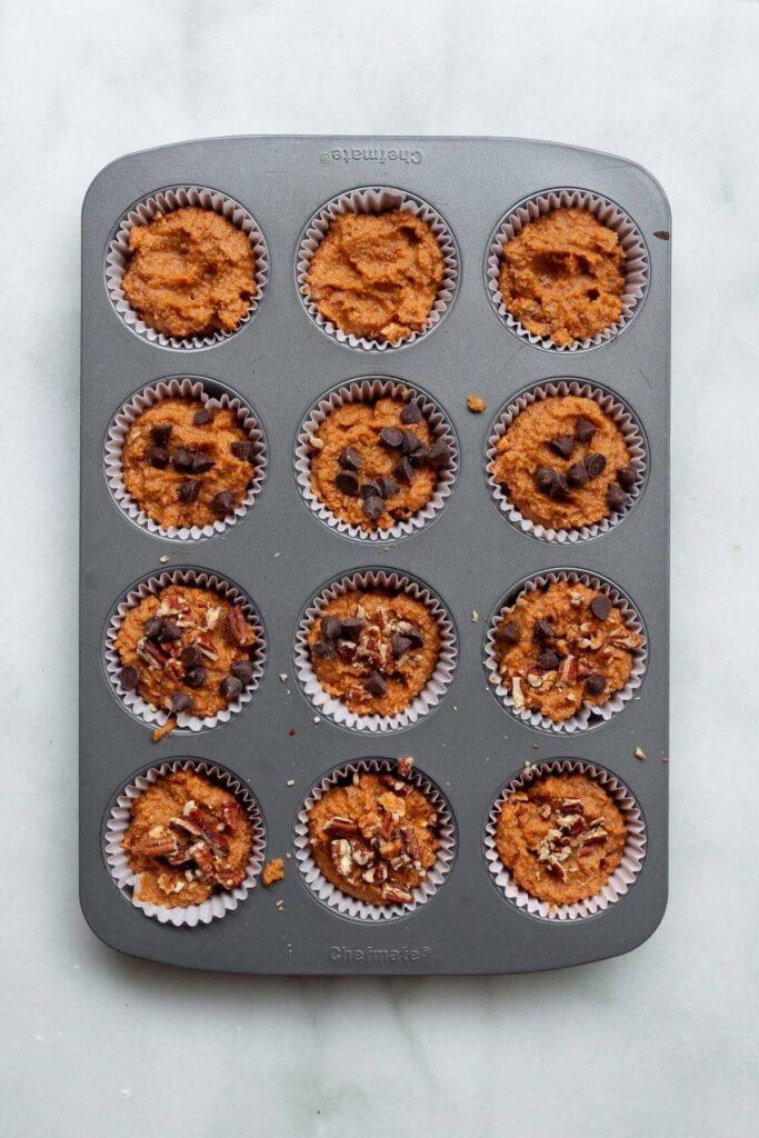 unbaked muffins in a muffin tin