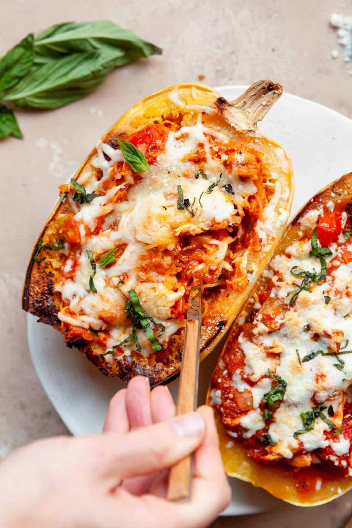 cheesy chicken parmesan stuffed spaghetti squash boat