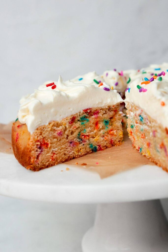 air fryer vanilla cake with rainbow sprinkles and vanilla buttercream