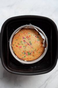 air fryer confetti cake in air fryer basket after air frying to show end result