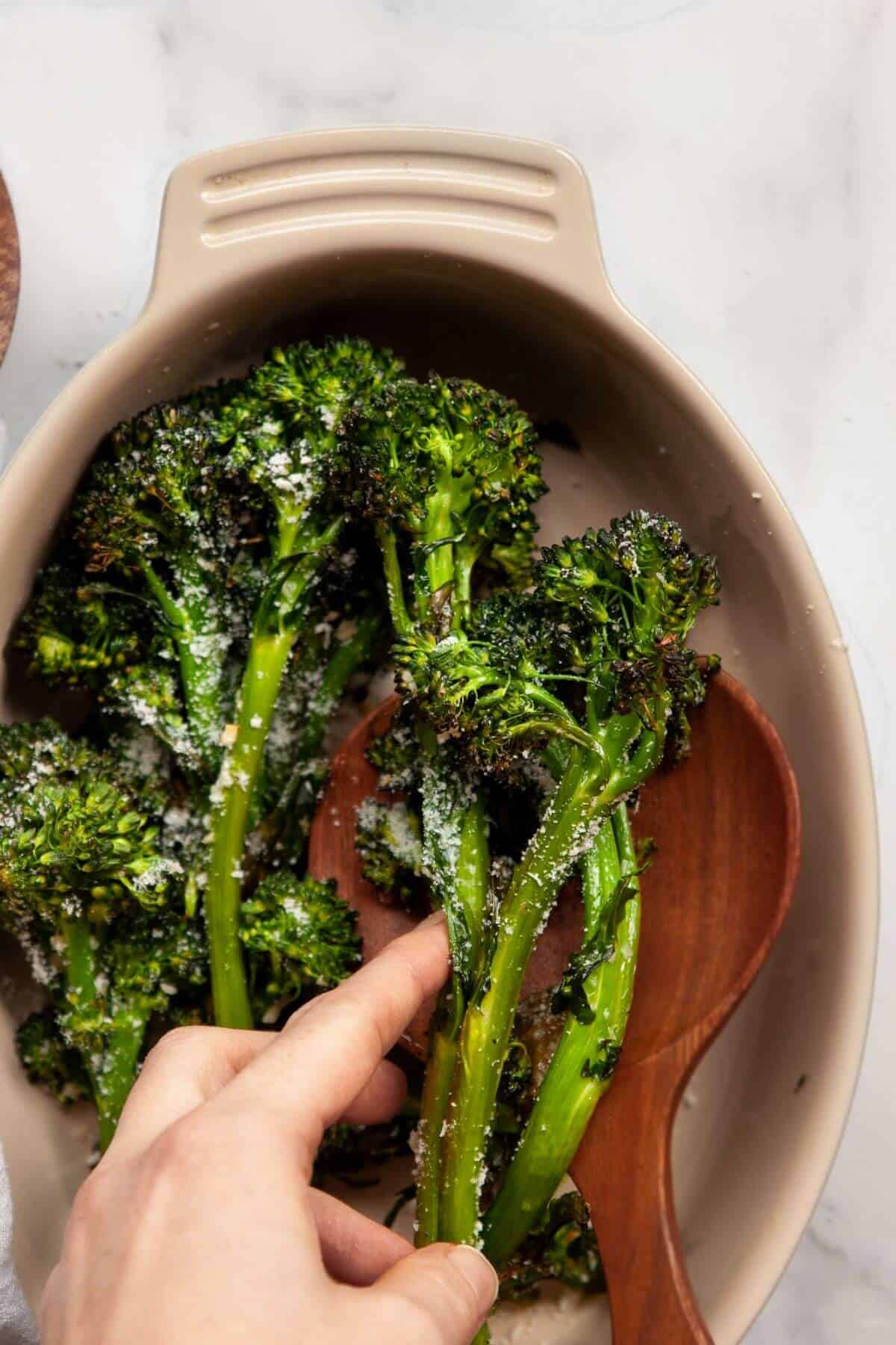 Garlicky air fryer broccolini finished with lemon and parmesan.