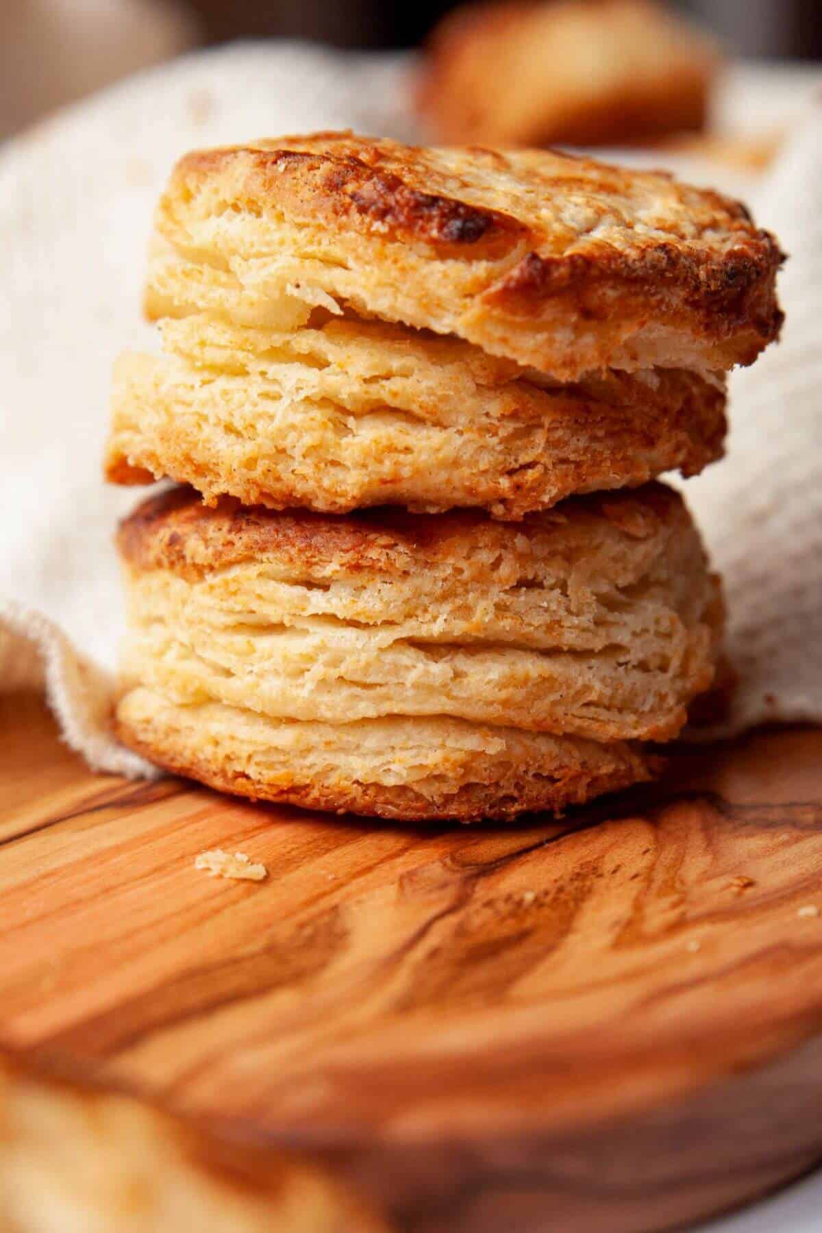 Buttery homemade air fryer buttermilk biscuits with laminated flakes.