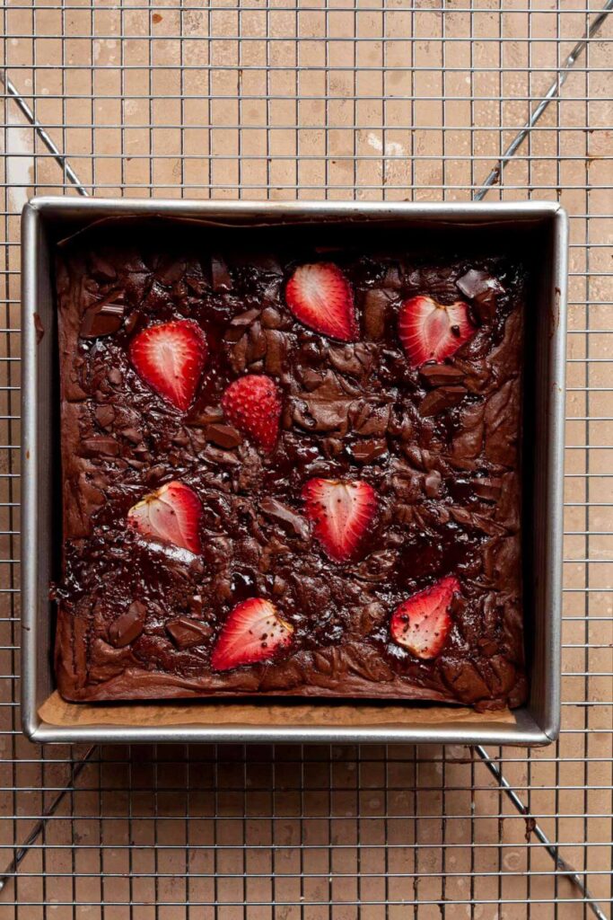 strawberry brownies in a pan after baking