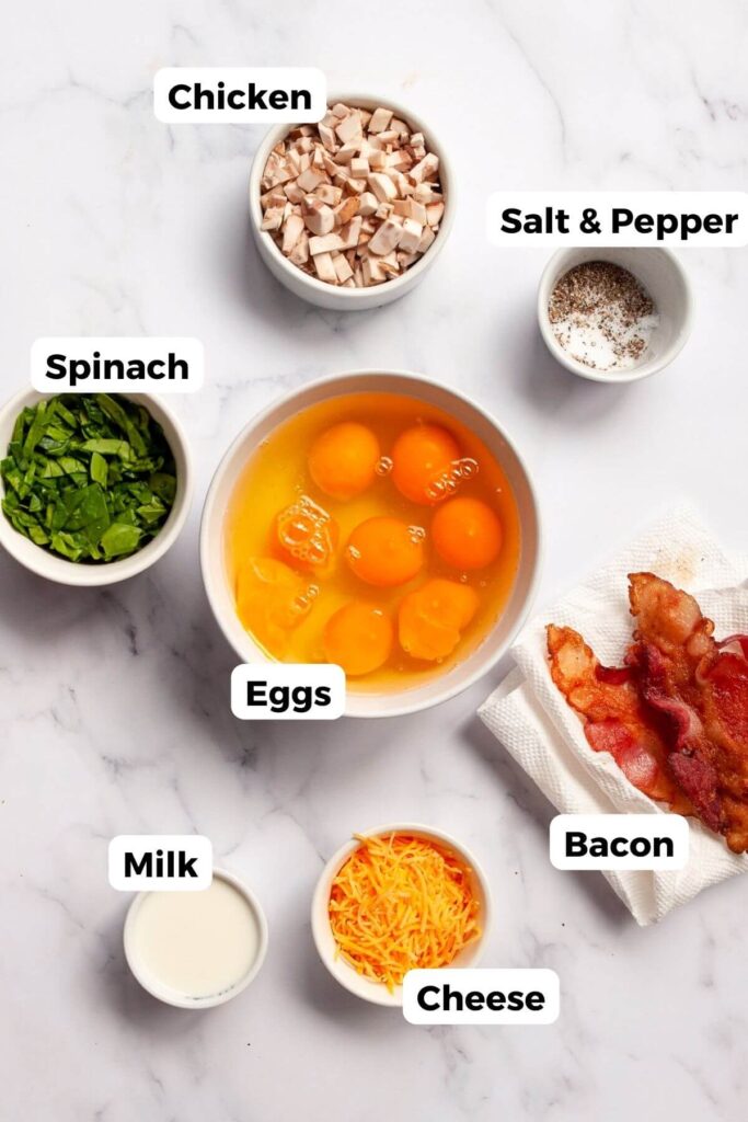 All the ingredients in keto egg bites in small bowls with labels