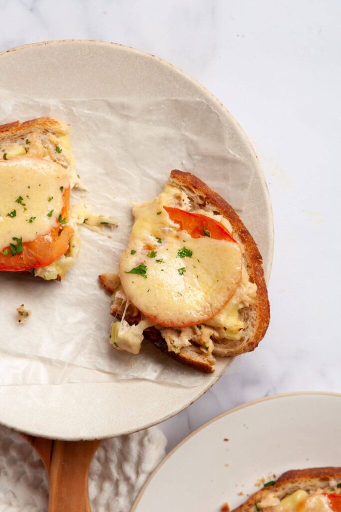 open-face tuna melt with tomato and cheddar cheese